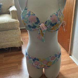 Two piece swimming suit top M size & bottom Large. Adjust on back & shoulder